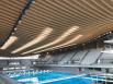 Le Centre Aquatique Olympique Métropole du Grand Paris en mode Héritage