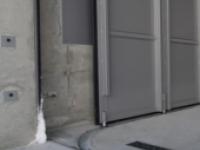 Porte coulissante à éléments