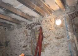 Renforcer un plancher à poutrelle dans une cave parisienne