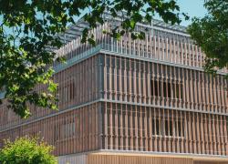Woodoo, le pionnier du bois augmenté, finalise la façade du MixCity à Renens