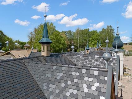 Tuiles plates ERLUS : l’intemporel qui sublime patrimoine et architecture contemporaine